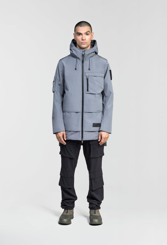 Alta Men's Performance Shell Jacket in hip length, Primaloft Gold Insulation Active+, chest and waist pockets, ventilation under arms, reflective detailing on hood and back, two-way front zipper, and non-removable hood with adjustable drawstrings, in Concrete