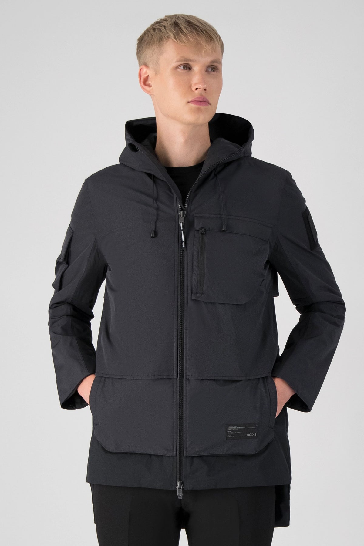 Alta Men's Performance Shell Jacket in hip length, Primaloft Gold Insulation Active+, chest and waist pockets, ventilation under arms, reflective detailing on hood and back, two-way front zipper, and non-removable hood with adjustable drawstrings, in Black