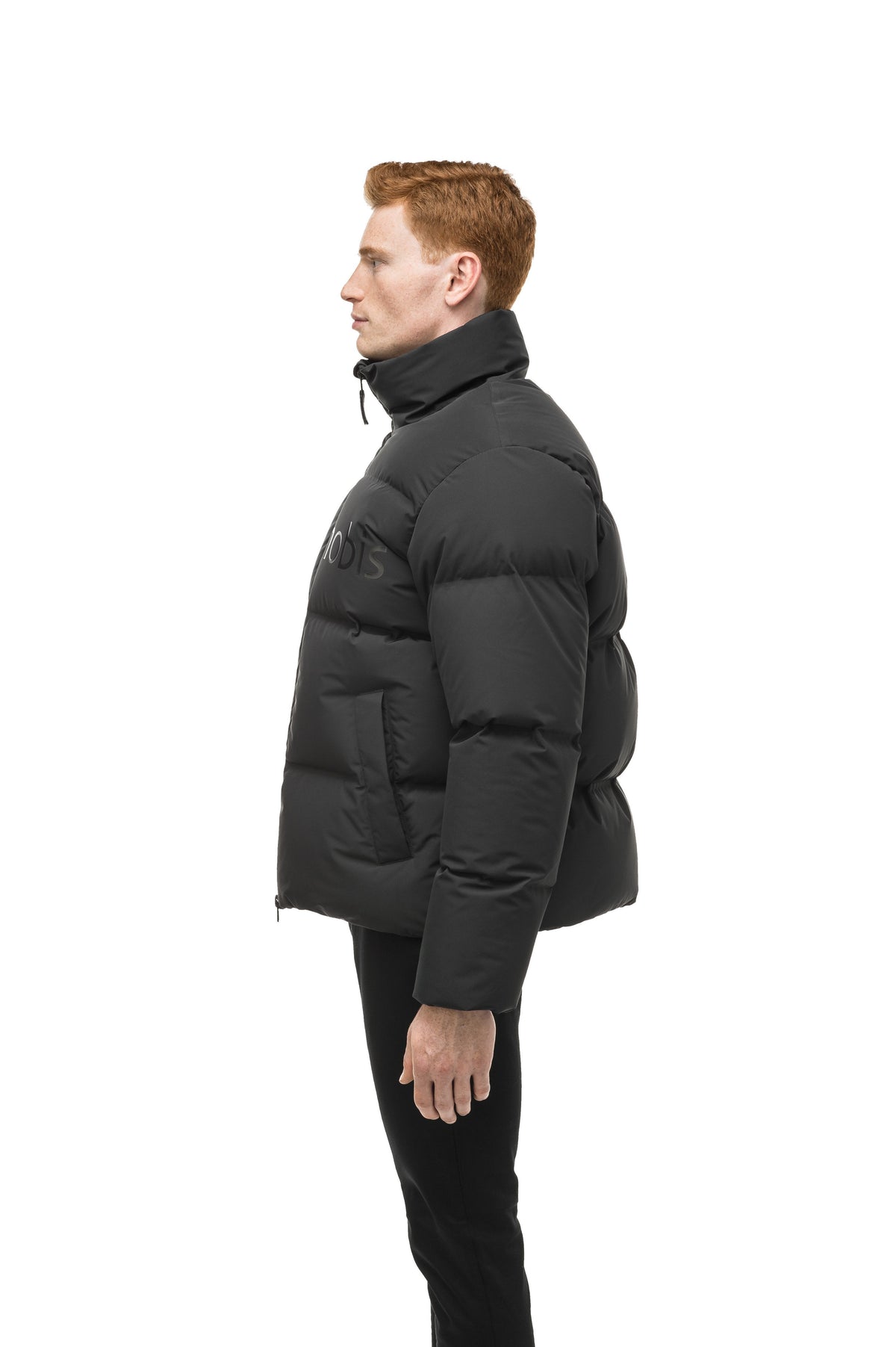 Men's puffer jacket with a minimalist modern design; featuring graphic details like oversized tonal branding, an exposed zipper, and seamless puffer channels in Black