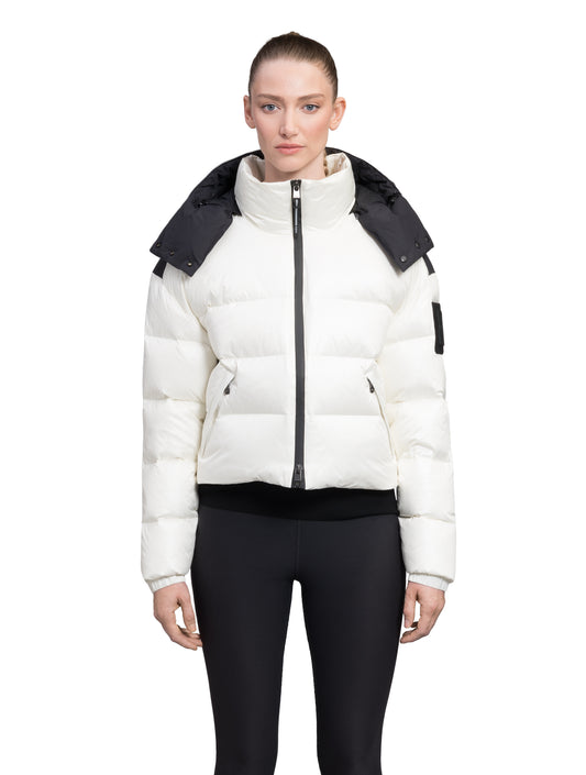 Tempus Women's Performance Short Puffer Jacket in waist length, premium technical nylon taffeta fabrication, Premium Canadian origin White Duck Down insulation, removable down-filled hood, two-way centre-front zipper, fleece-lined zipper pockets at waist, pit zipper vents, in Chalk