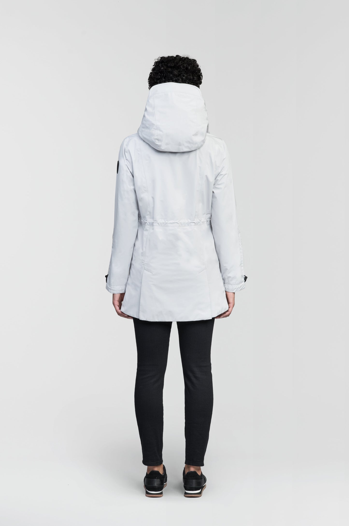 Women's thigh length raincoat with collar and non-removable hood in Light Grey