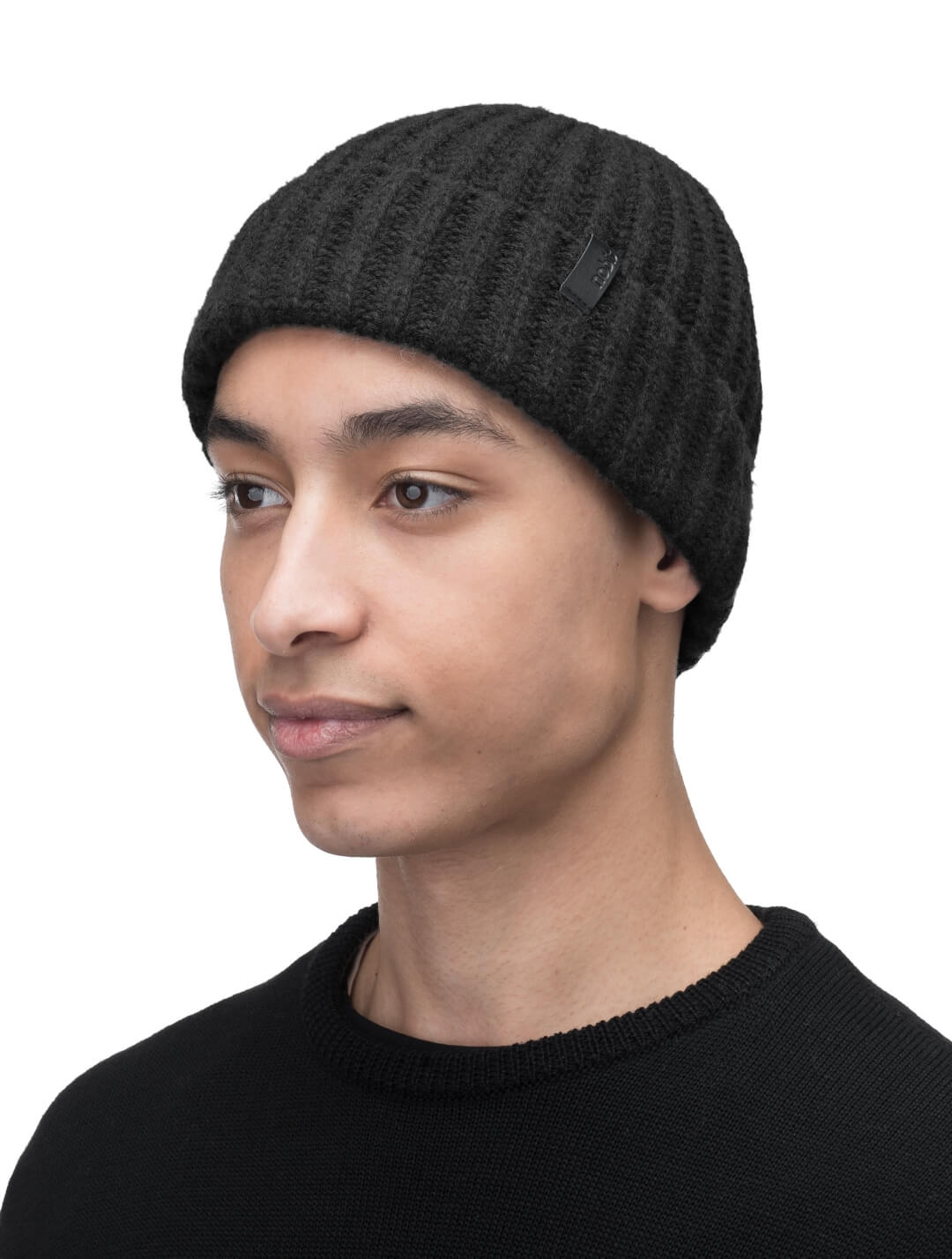 Dew Unisex Cable Knit Beanie in superfine merino wool and cashmere, and nobis leather label at cuff, in Black