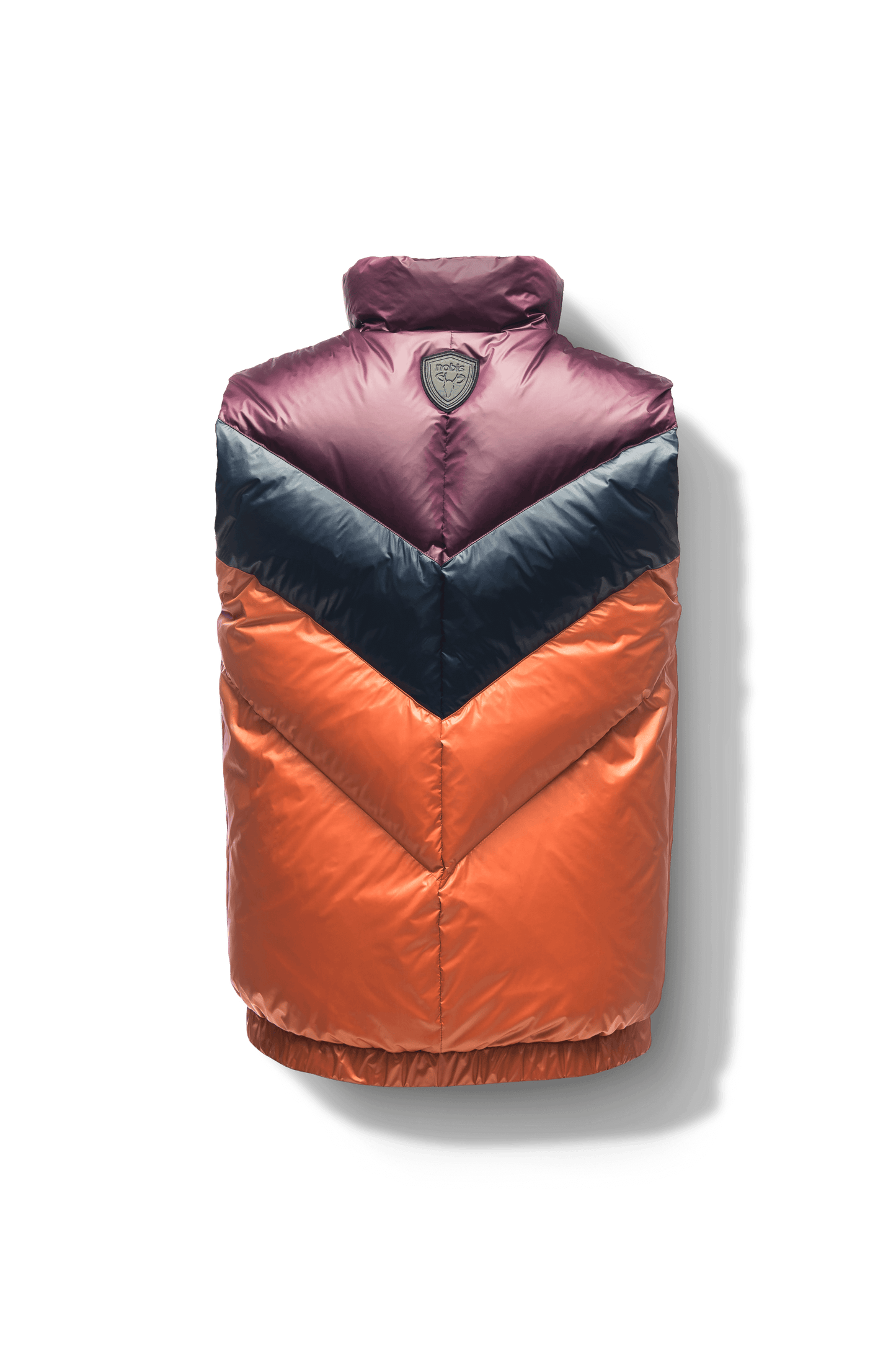 Kylo Men's Chevron Quilted Vest in hip length, premium cire technical nylon taffeta fabrication, Premium Canadian origin White Duck Down insulation, two-way centre-front zipper, fleece-lined pockets at waist, elasticized waistband, in Burnt Orange