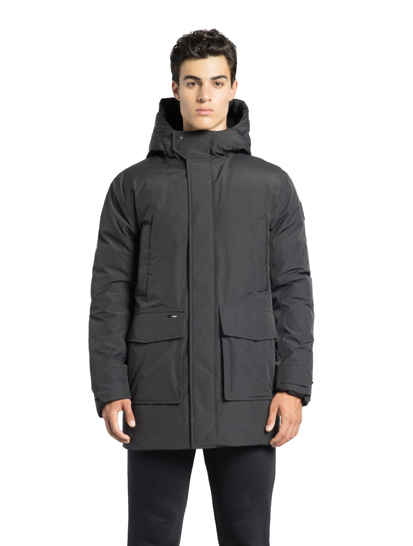 Kason Men's Light Down Parka in thigh length, premium 3-ply micro denier and stretch ripstop fabrication, Premium Canadian origin White Duck Down insulation, non-removable down-filled hood, two-way centre-front zipper, magnetic closure wind flap, fleece-lined pockets at chest and waist, flap pockets at waist, pit zipper vents, in Black