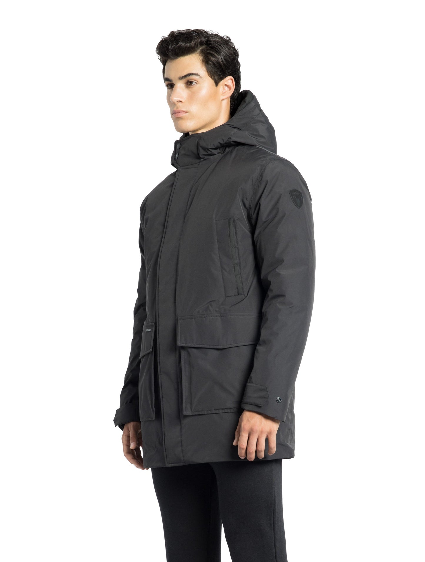 Kason Men's Light Down Parka in thigh length, premium 3-ply micro denier and stretch ripstop fabrication, Premium Canadian origin White Duck Down insulation, non-removable down-filled hood, two-way centre-front zipper, magnetic closure wind flap, fleece-lined pockets at chest and waist, flap pockets at waist, pit zipper vents, in Black