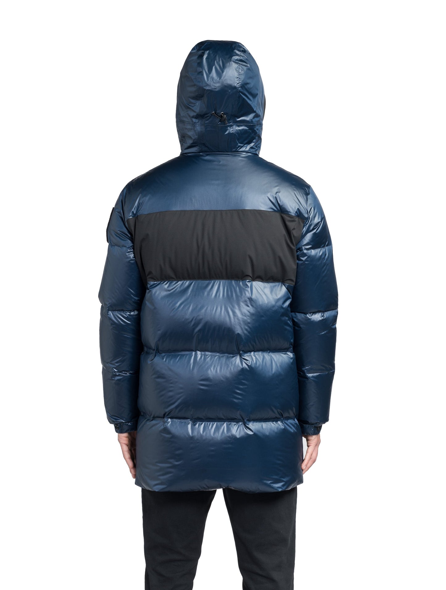 Neelix Men's Long Puffer Jacket in thigh length, premium cire technical nylon taffeta and stretch ripstop fabrication, Premium Canadian origin White Duck Down insulation, non-removable down-filled hood, two-way centre-front zipper, pit zipper vents, hidden chest zipper pockets, fleece-lined magnetic closure waist pockets, in Marine