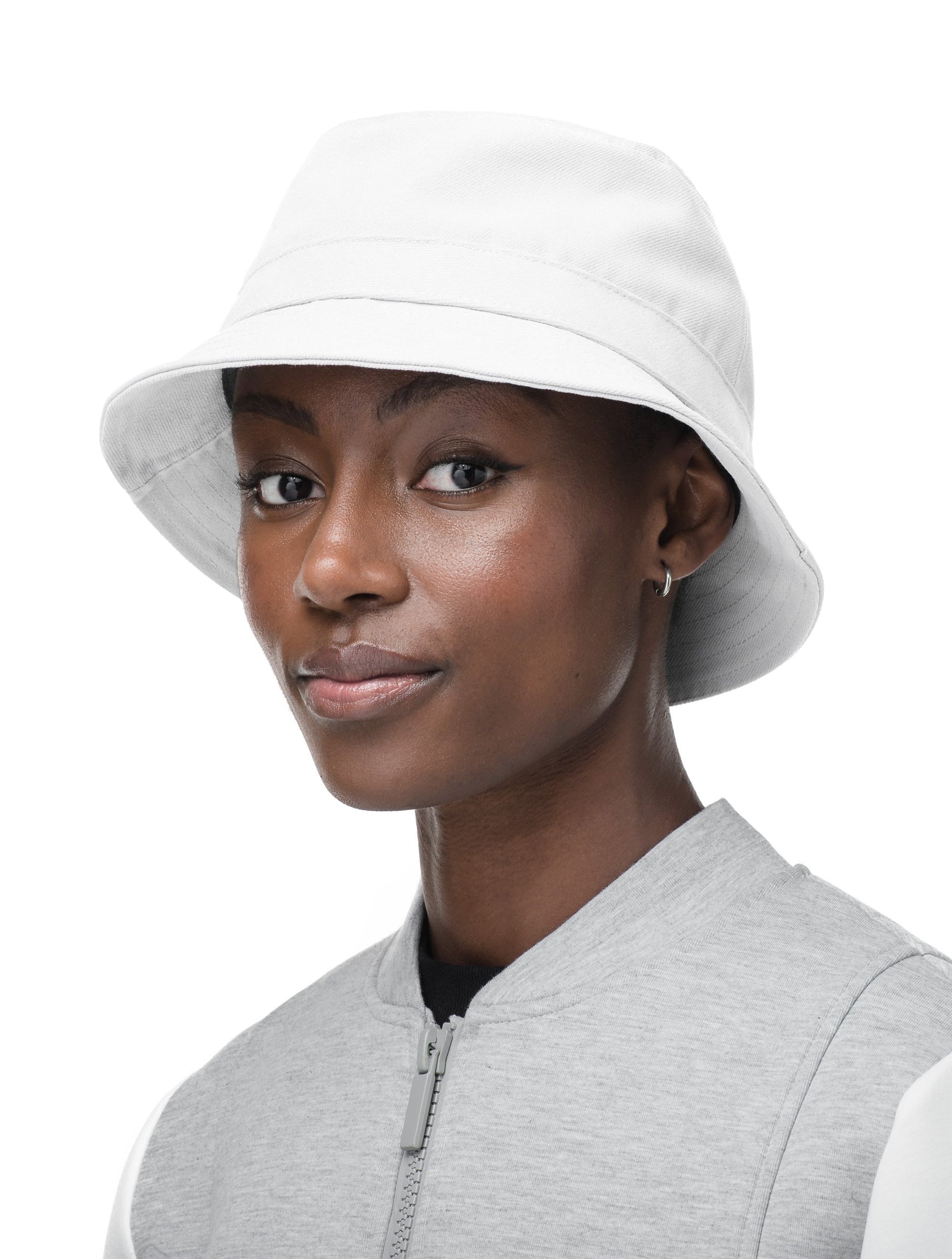 Unisex bucket hat with flat crown top and stitching detail on brim in Optic White