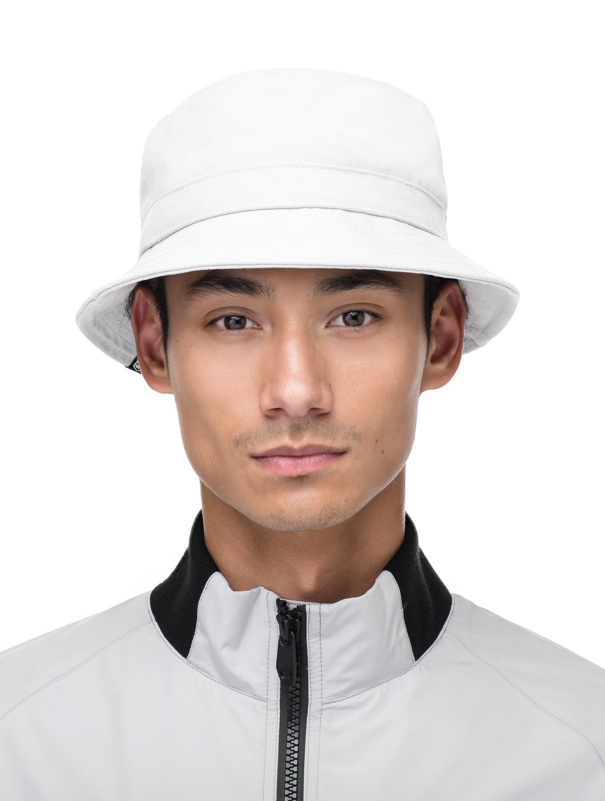 Unisex bucket hat with flat crown top and stitching detail on brim in Optic White