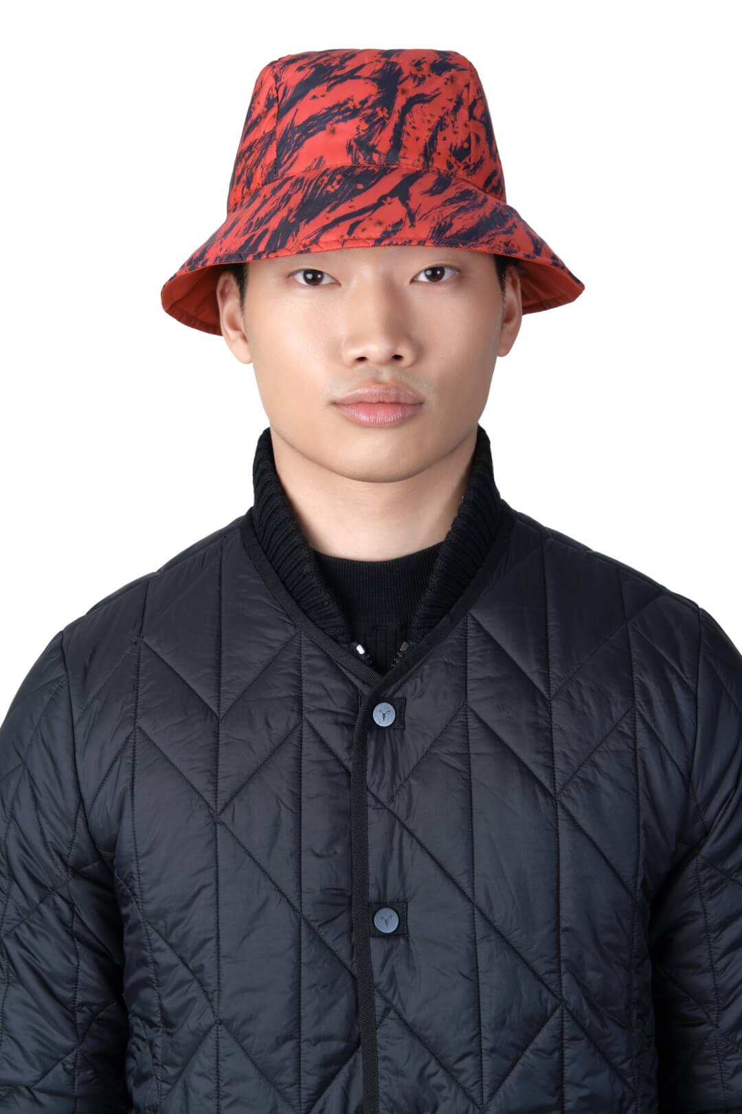 Lunar New Year Reversible Bucket Hat with one side in red tiger print, and the reverse side in tonal red with Nobis label branding on the crown front, in Vermillion