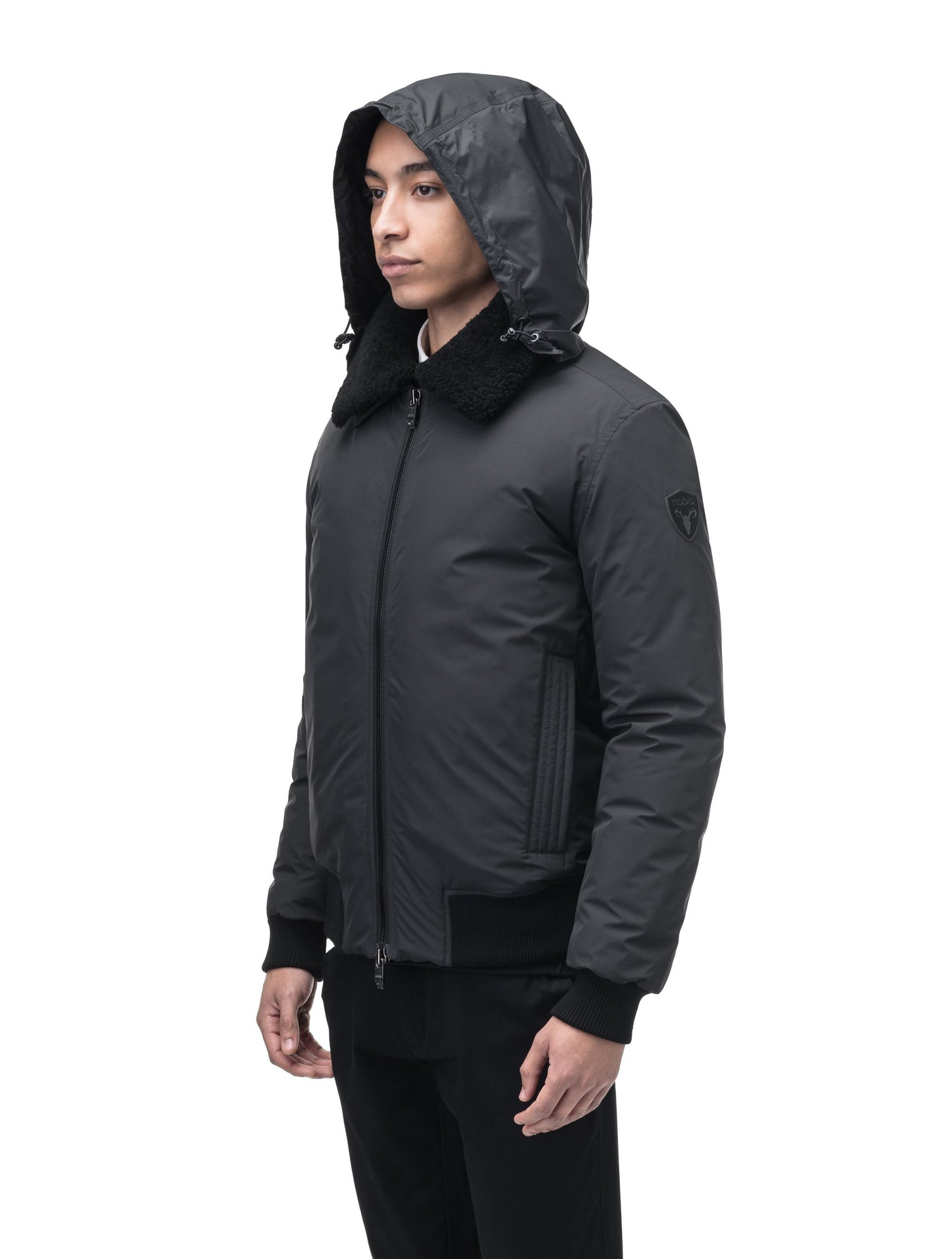 Sonar Men's Aviator Jacket in hip length, Canadian duck down insulation, removable shearling collar with hidden tuckable hood, and two-way front zipper, in Black